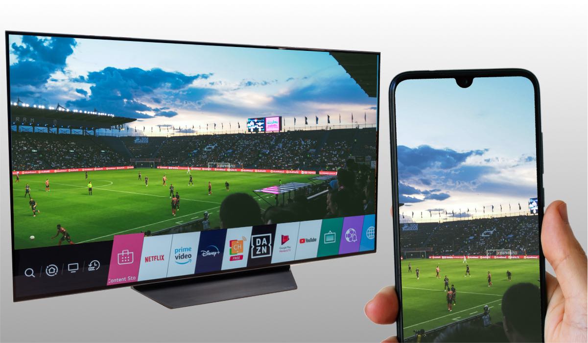 A smartphone casting an image of football stadium to an LG TV